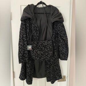 Mycra Pac Lightweight reversible rain coat